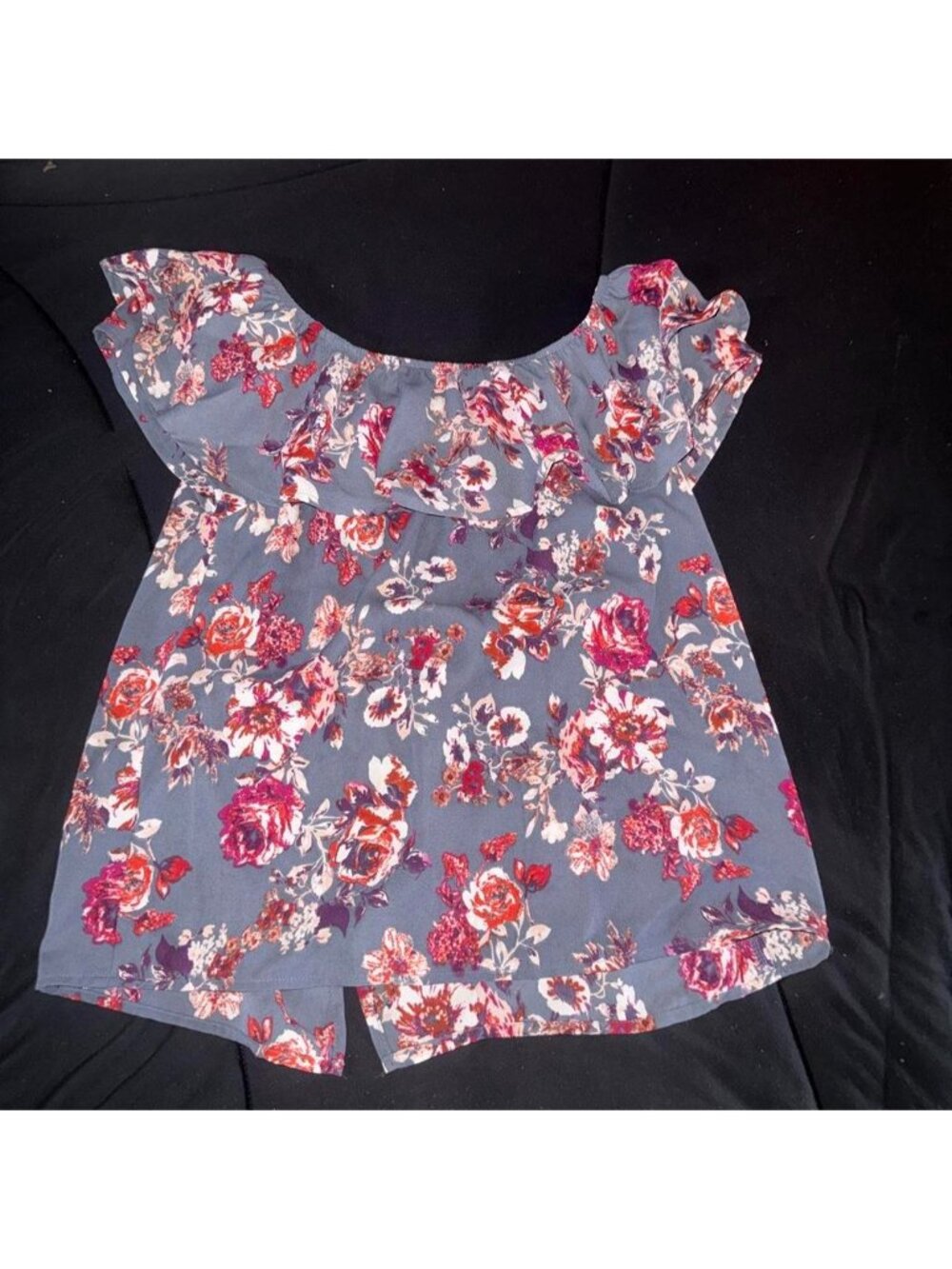 Floral babydoll top with ruffle sleevesSize xs...